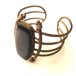 Black and brass bracelet